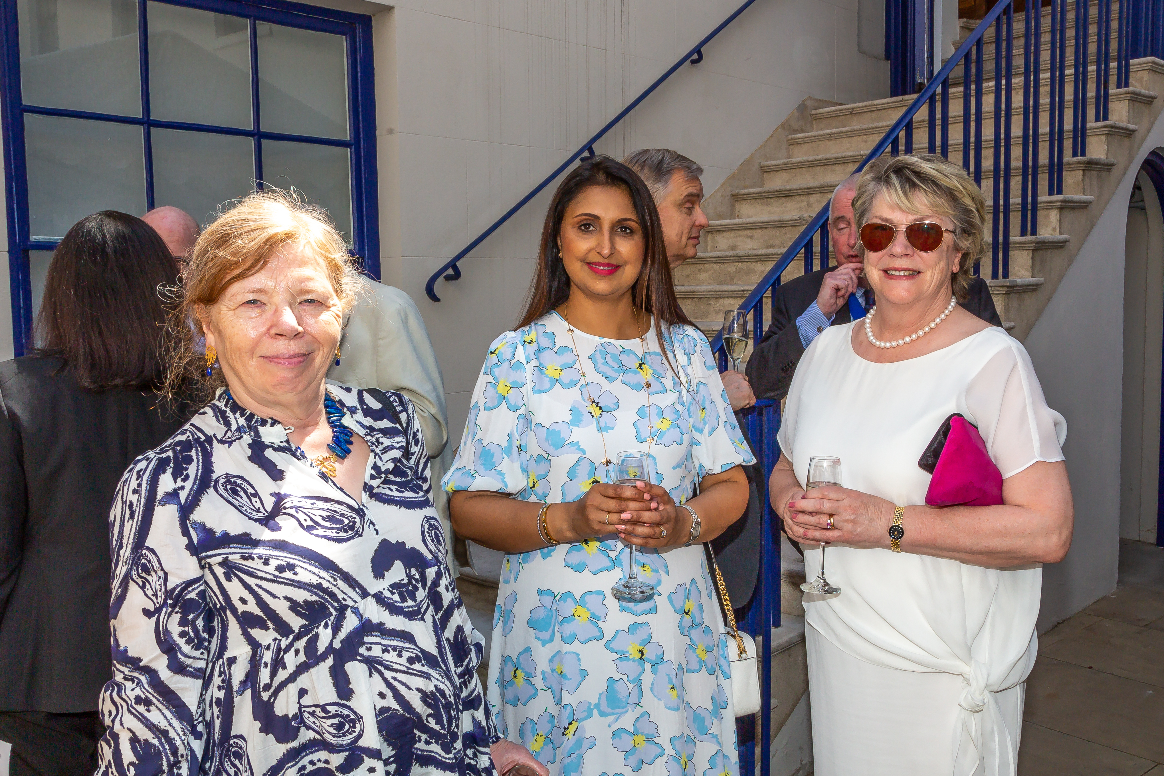 Three Liverymen (women of varying ages) dressed in Summer formal wear at the 2022 June Court Lunch held at Apothecaries' Hall.